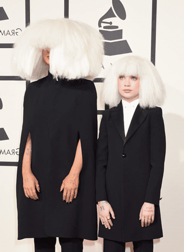 faceless music artist Sia and Maddie at the Grammys in 2015